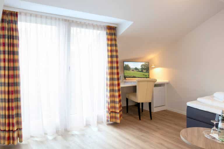 codoma_Amtsheide Golfhotel Zimmer 402 TV_Original (kommerz
